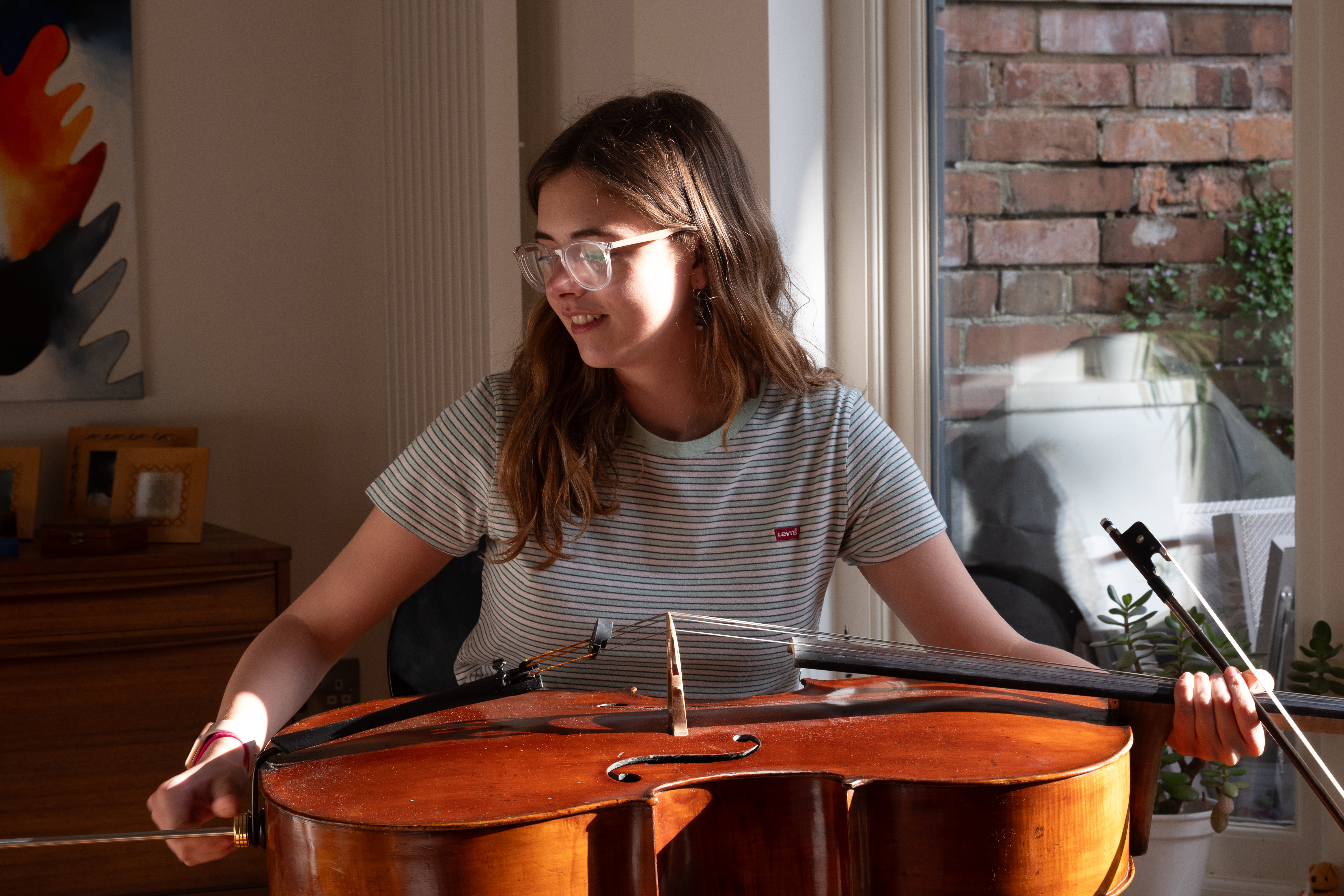 Sophie holding Cello